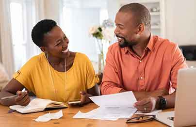 man and woman getting home improvement financing